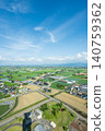 May in Oyabe City, Toyama Prefecture: A vertical view of the scattered villages and tower of shadows in the Tonami Plain / Dispersed set 140759362