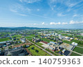Crossland Oyabe and its surrounding facilities and lush green plains in Oyabe City, Toyama Prefecture in May / Crossland Oyabe 140759363