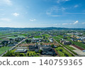 May in Toyama, Oyabe City, Toyama Prefecture: Crossland Oyabe's main hall and the Tonami Plain / Crossland Oy 140759365
