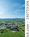 Crossland Oyabe Main Hall and Tonami Plain in vertical orientation in Oyabe City, Toyama Prefecture / Vertical view 140759366