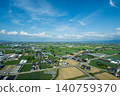 A view of the scattered settlements in the Tonami Plain from an observation deck in Oyabe City, Toyama Prefecture, in May. 140759370