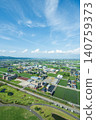May in Oyabe City, Toyama Prefecture: Vertical view of the area around Crossland Oyabe and the surrounding rural landscape. 140759373