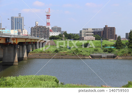 Summer in Arakawa: At Shin-Arakawa Bridge (looking towards Kawaguchi) Summer in Arakawa: At Shin-Arakawa Bridge (looking towards Kawaguchi) 140759503