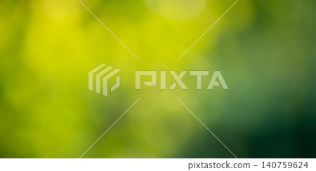 Defocused abstract natural background. Green defocused lights of plants. 140759624