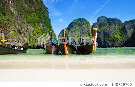 Tropical beach, longtail boats, Andaman Sea, Thailand Tropical beach, longtail boats, Andaman Sea, Thailand 140759760