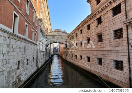 The Bridge of Sighs as seen from the Ponte dell'Aggio in the early morning in the old town of Venice, Italy. The Bridge of Sighs as seen from the Ponte dell'Aggio in the early morning in the old town of Venice, Italy. 140759995