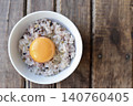 Sixteen-grain rice with raw egg 140760405