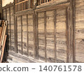 The wall of an old wooden building 140761578