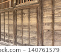 The wall of an old wooden building 140761579