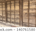 The wall of an old wooden building 140761580