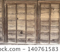 The wall of an old wooden building 140761583