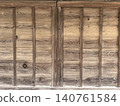 The wall of an old wooden building 140761584