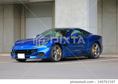 A blue Italian sports car 140761587