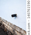 Abstract art composition of water source flowing from a rusty metal pipe 140761590