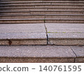Abstract geometry of granite stairs with a rhythmic pattern of stone steps 140761595