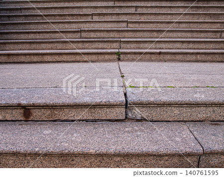 Abstract geometry of granite stairs with a rhythmic pattern of stone steps Abstract geometry of granite stairs with a rhythmic pattern of stone steps 140761595