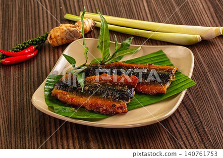 Grilled eel on banana leaf with lemongrass and chili Grilled eel on banana leaf with lemongrass and chili 140761753