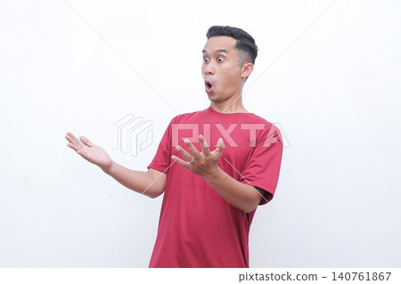 Man wears red tee, shocked expression. Hands raised, mouth open wide. Pure astonishment, dramatic surprise. Studio shot, clean white background. Perfect for reaction, shock, or disbelief scenes Man wears red tee, shocked expression. Hands raised, mouth open wide. Pure astonishment, dramatic surprise. Studio shot, clean white background. Perfect for reaction, shock, or disbelief scenes 140761867