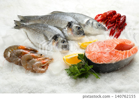 Fresh fish and different seafood on ice Fresh fish and different seafood on ice 140762155