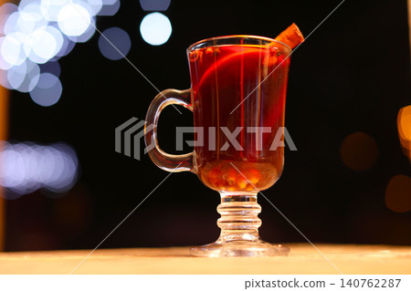 Tasty aromatic mulled wine on table at winter fair 140762287
