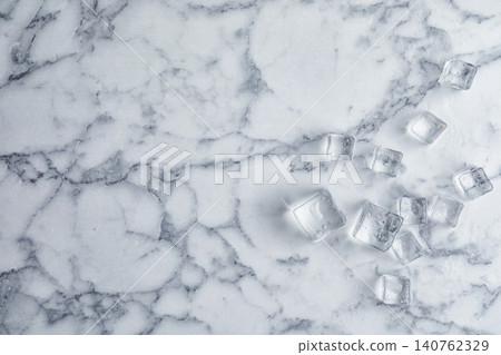 Crystal clear ice cubes with water drops on white marble table, flat lay. Space for text Crystal clear ice cubes with water drops on white marble table, flat lay. Space for text 140762329