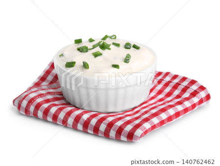 Fresh sour cream with onion and fabric on white background Fresh sour cream with onion and fabric on white background 140762462