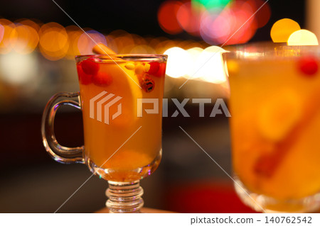 Tasty aromatic mulled wine on blurred background 140762542