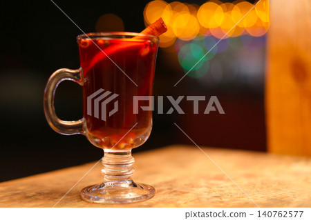 Tasty aromatic mulled wine on table at winter fair 140762577