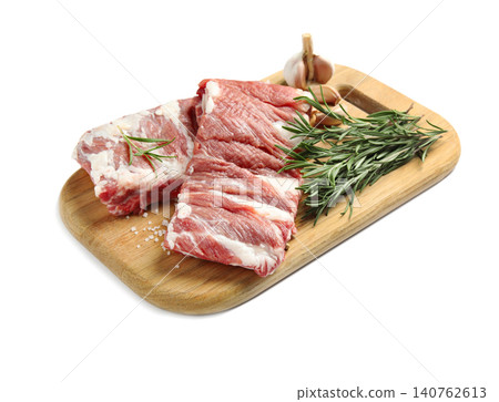 Raw ribs with rosemary and salt isolated on white Raw ribs with rosemary and salt isolated on white 140762613