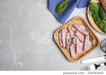Tasty ham served on light grey marble table, flat lay. Space for text 140762643