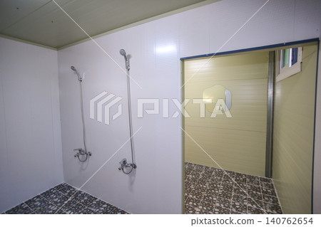 Interior of a Clean Communal Public Shower Room Facility Interior of a Clean Communal Public Shower Room Facility 140762654