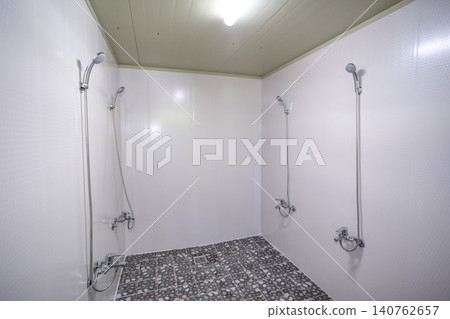 Interior of a Clean Communal Public Shower Room Facility Interior of a Clean Communal Public Shower Room Facility 140762657
