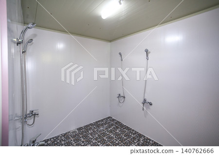 Interior of a Clean Communal Public Shower Room Facility Interior of a Clean Communal Public Shower Room Facility 140762666