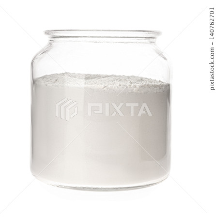 Organic flour in glass jar isolated on white Organic flour in glass jar isolated on white 140762701