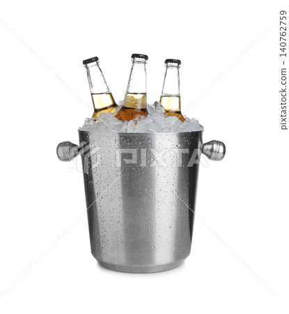Beer in metal bucket with ice isolated on white Beer in metal bucket with ice isolated on white 140762759
