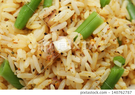 Tasty rice pilaf with vegetables as background, closeup Tasty rice pilaf with vegetables as background, closeup 140762787
