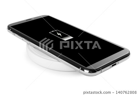 Mobile phone charging with wireless pad isolated on white 140762808