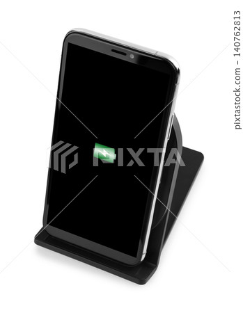 Mobile phone charging with wireless pad isolated on white Mobile phone charging with wireless pad isolated on white 140762813
