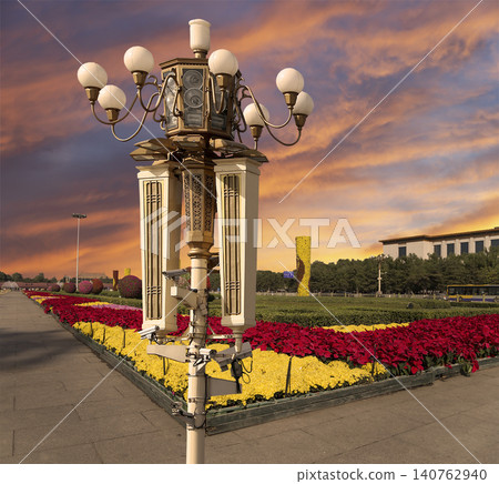 Street lamp on Tiananmen Square in Beijing, China (against the sunset), with propaganda or public announcement speakers Street lamp on Tiananmen Square in Beijing, China (against the sunset), with propaganda or public announcement speakers 140762940