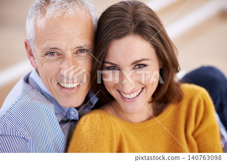 Couple, age difference and smile in portrait, love with unique relationship and support for trust at home. Senior man, young woman in marriage, commitment and loyalty with partner and pride together Couple, age difference and smile in portrait, love with unique relationship and support for trust at home. Senior man, young woman in marriage, commitment and loyalty with partner and pride together 140763098