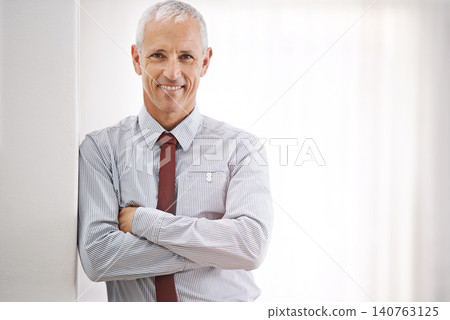 Portrait, senior man and professional with arms crossed, mockup space or agent in workplace. Face, mature person or entrepreneur with confidence or employee with startup or corporate with business Portrait, senior man and professional with arms crossed, mockup space or agent in workplace. Face, mature person or entrepreneur with confidence or employee with startup or corporate with business 140763125