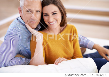 Couple, age difference and smile for love in unique relationship, portrait and support for trust at home. Senior man, young woman and marriage, commitment and loyalty with partner and pride together Couple, age difference and smile for love in unique relationship, portrait and support for trust at home. Senior man, young woman and marriage, commitment and loyalty with partner and pride together 140763216