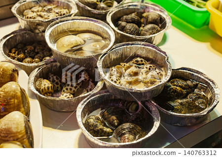 Assorted shellfish at Taiwanese street food stall Assorted shellfish at Taiwanese street food stall 140763312