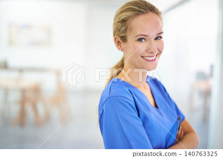 Nurse, arms crossed or portrait of a happy woman in hospital for medical, support or mockup space. Smile, healthcare and confident female surgeon nursing in clinic for wellness, medicine or treatment Nurse, arms crossed or portrait of a happy woman in hospital for medical, support or mockup space. Smile, healthcare and confident female surgeon nursing in clinic for wellness, medicine or treatment 140763325