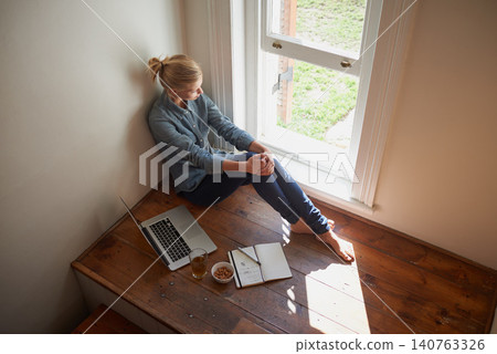 Woman, laptop and elearning, thinking of ideas and study or research for project with top view. Education, academic online course for university and student at window, insight or inspiration at home Woman, laptop and elearning, thinking of ideas and study or research for project with top view. Education, academic online course for university and student at window, insight or inspiration at home 140763326