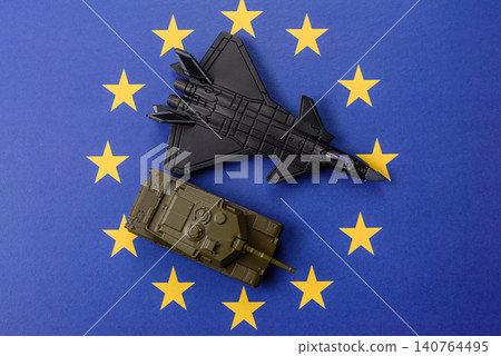 A fighter jet on the European Union flag as a conceptual backdrop representing Europe's defense A fighter jet on the European Union flag as a conceptual backdrop representing Europe's defense 140764495