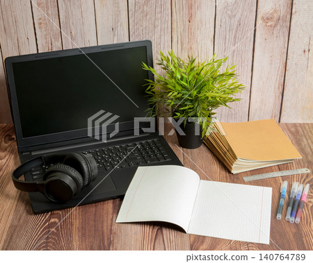headphones notebook ruler markers and laptop on table headphones notebook ruler markers and laptop on table 140764789