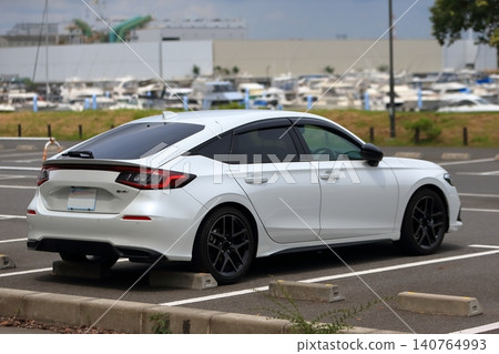 White Japanese sedan White Japanese sedan 140764993