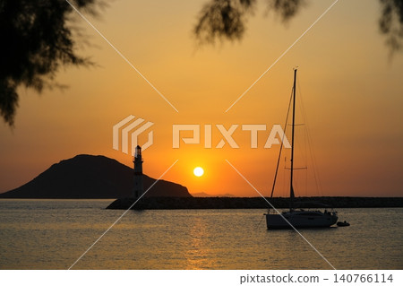 Seascape at sunshine. Lighthouse and sailings on the coast. Seaside town of Turgutreis and spectacular sunshine 140766114