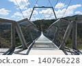 Arouca 516 suspension bridge crossing a dramatic valley in Portugal, showcasing modern engineering, adventure tourism, geometric design, scenic landscapes, and outdoor exploration 140766228
